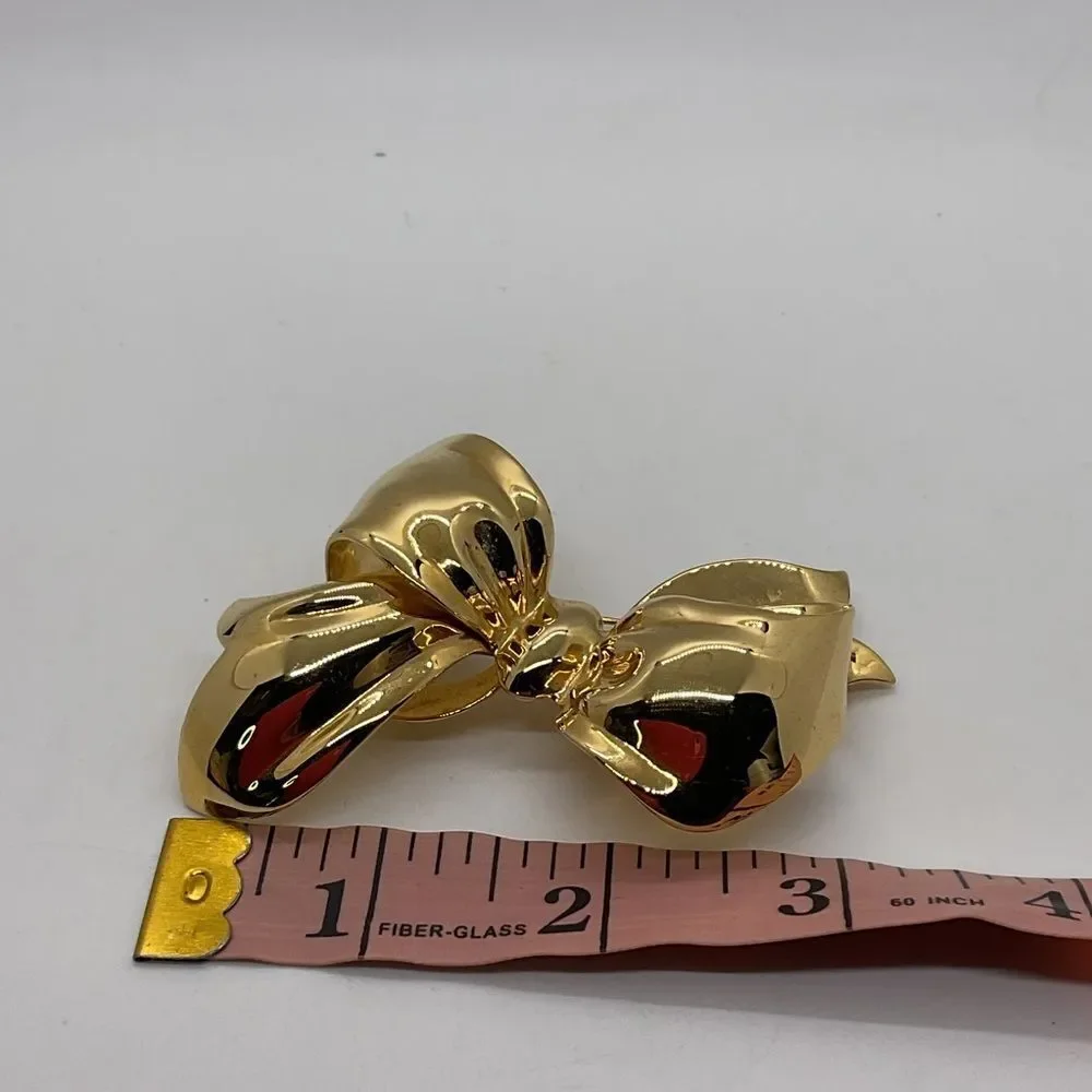 Monet Gold Toned Bow Brooch